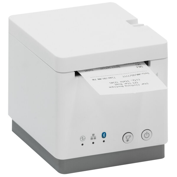 A white Star mC-Print2 receipt printer with paper roll on top.