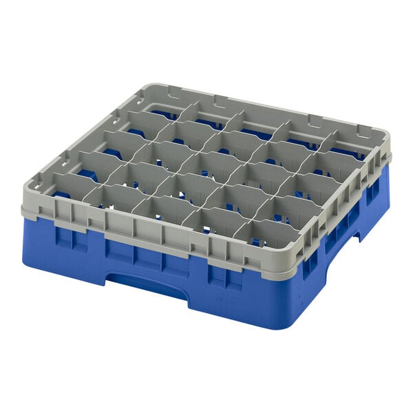 A blue and grey plastic Cambro glass rack with white compartments.