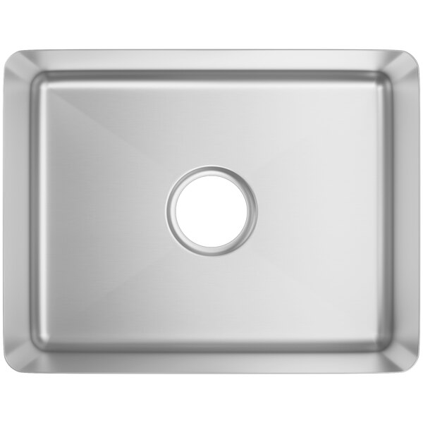 A close-up of a stainless steel Regency sink bowl with a hole in the center.