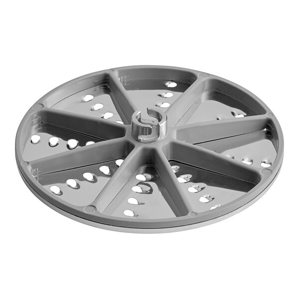 A gray circular seal ring with holes in it.