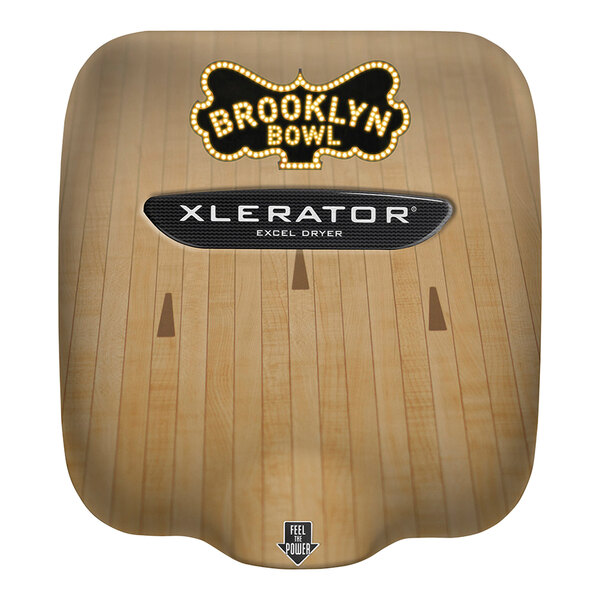 A close up of a bowling ball with an Excel XLERATOR cast cover hand dryer.
