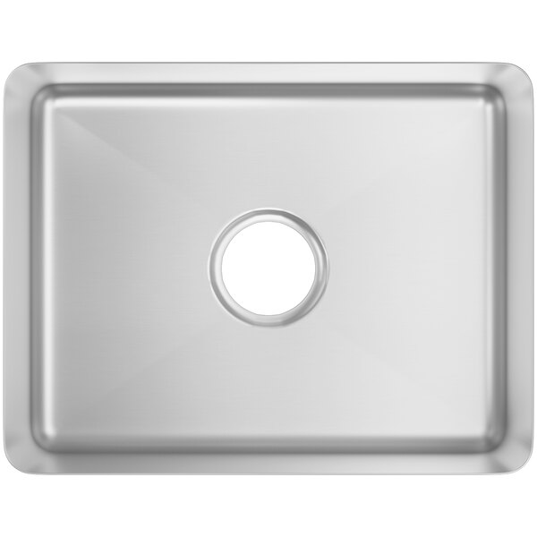 A Regency stainless steel fabricated undermount sink bowl with a hole in the center.