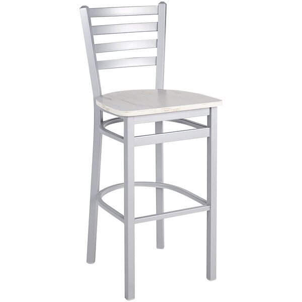 A silver metal BFM Seating ladder back barstool with a wooden seat.