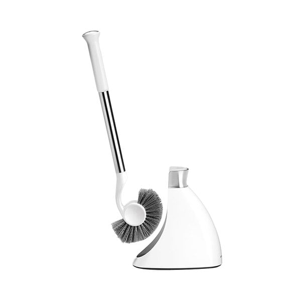 A white simplehuman toilet brush with a silver handle.