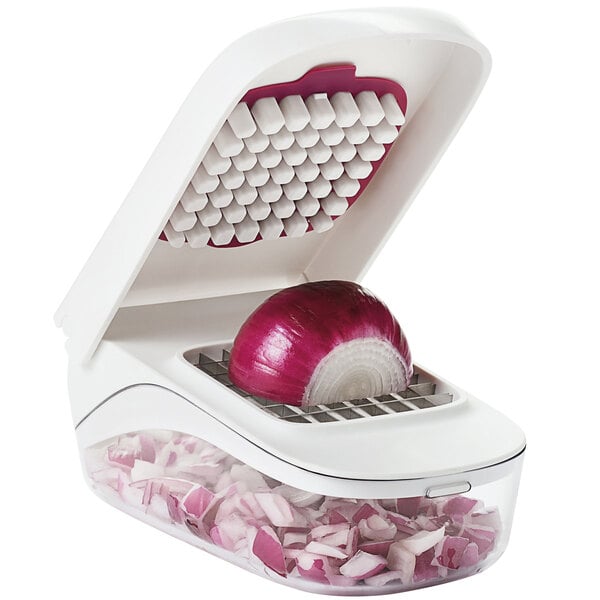 An OXO vegetable chopper with a red onion inside.