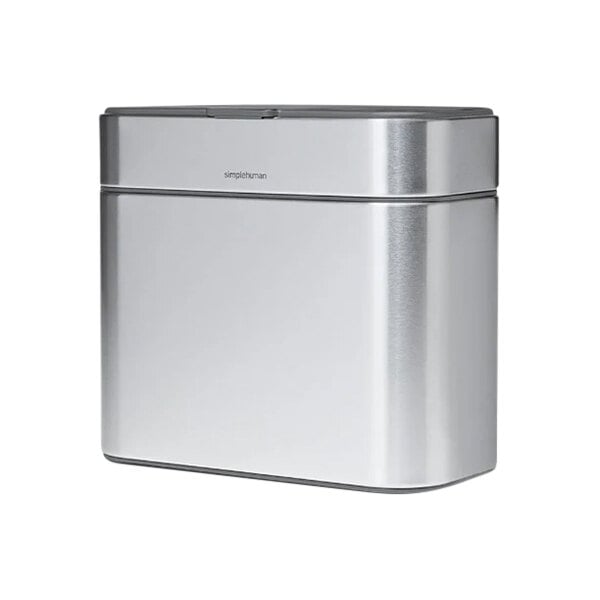 A simplehuman stainless steel rectangular compost caddy with a lid.