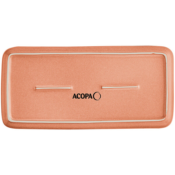 A rectangular terra cotta porcelain platter with a white border.