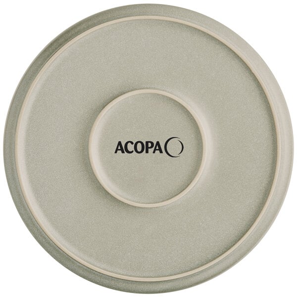 A white Acopa porcelain plate with black text on it.