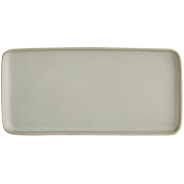 A white rectangular porcelain platter with a white border.