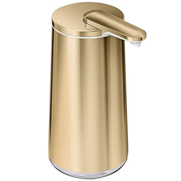 A gold simplehuman foam soap dispenser with a white liquid dispenser