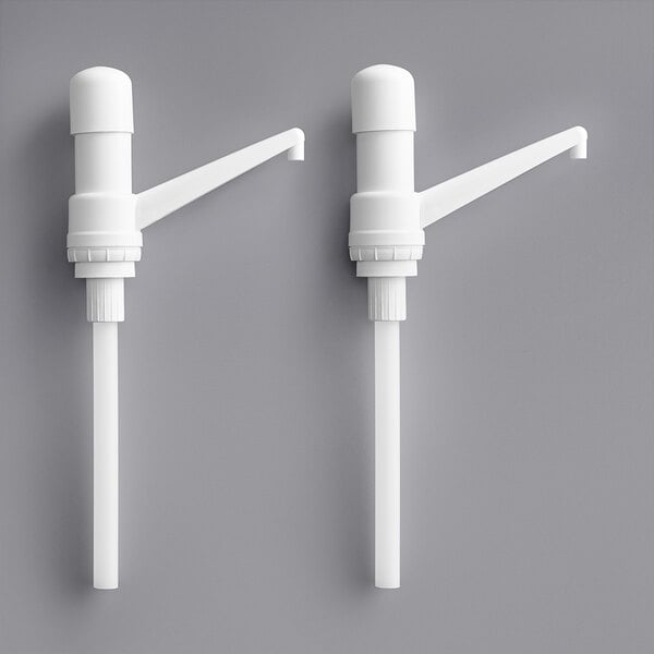 A white plastic pump with a long spout and a white cap.