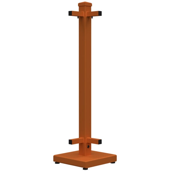 A burnt orange metal corner stand with black handles.
