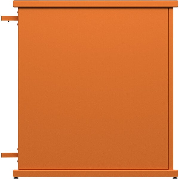 An orange metal end planter with circle top cut-outs.