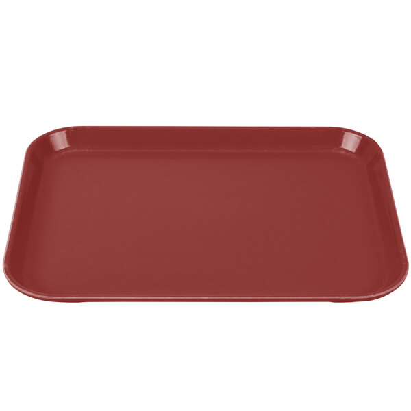 A red Cambro Camlite tray on a counter.