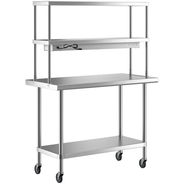 A Regency stainless steel work table with shelves on wheels.