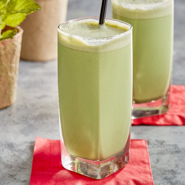 Two glasses of Fanale matcha green tea powder mix in green drinks.