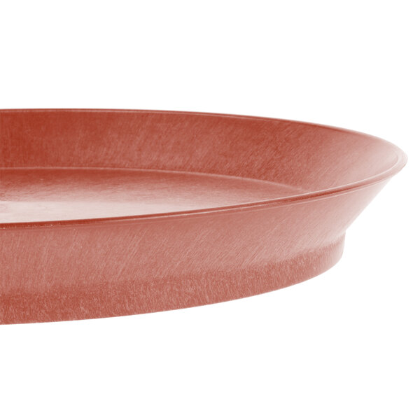 A red oval polypropylene deli server with a short base.