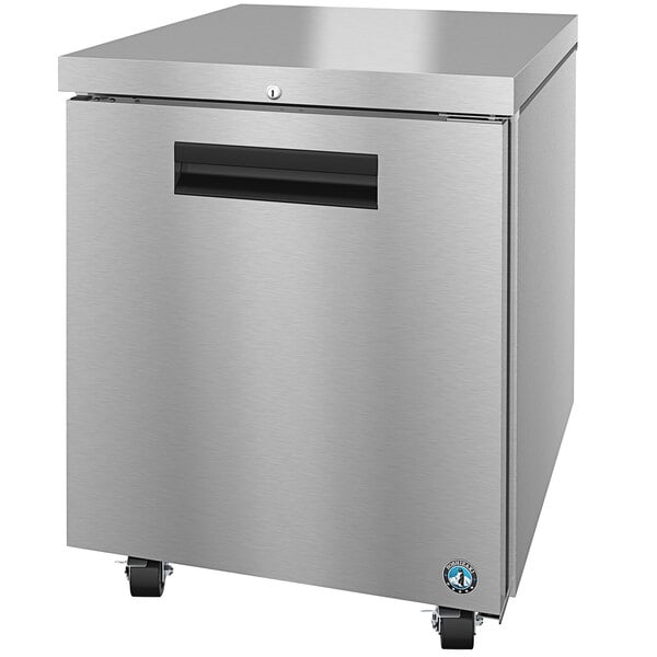 A stainless steel Hoshizaki undercounter freezer with a black handle on wheels.