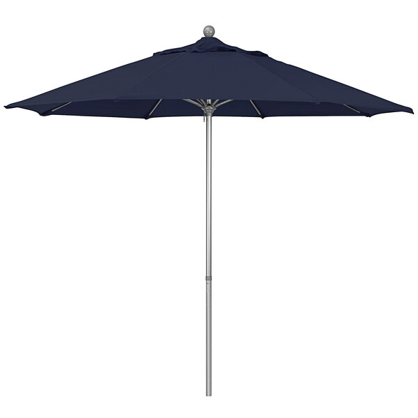 A close-up of a navy blue California Umbrella on a gray metal pole.