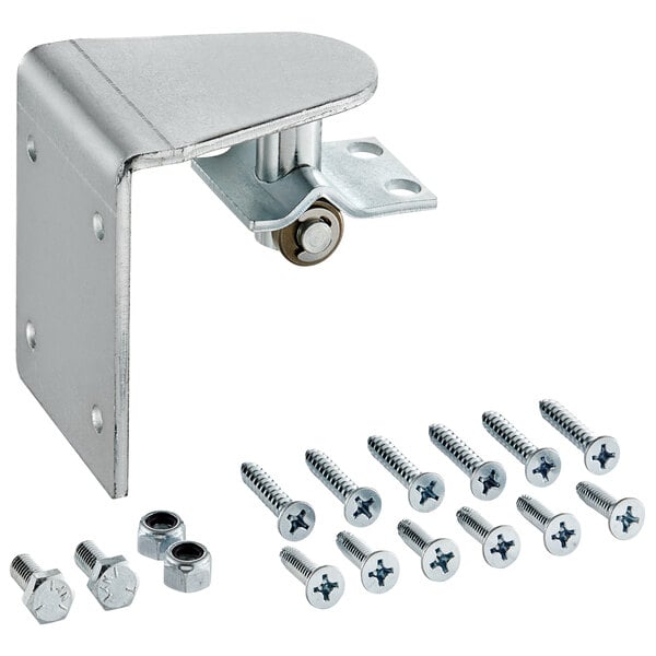 A metal bracket with screws and nuts on a table.
