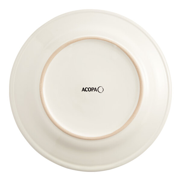 An Acopa ivory stoneware plate with a wide rolled edge.