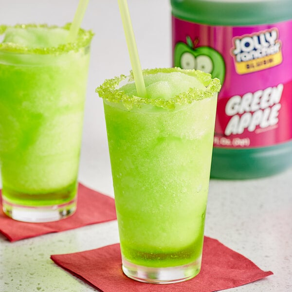 Green apple slushie in a glass cup