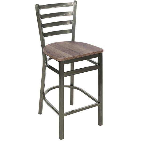 A BFM Seating metal counter height barstool with a wooden seat.