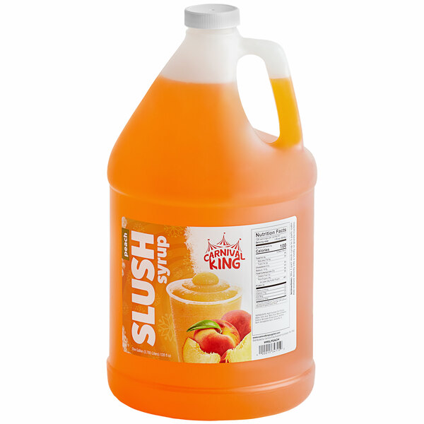 A jug of orange Carnival King Peach Slushy syrup.