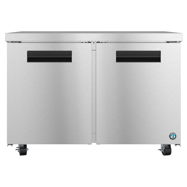 A stainless steel Hoshizaki undercounter refrigerator with two doors and black handles.