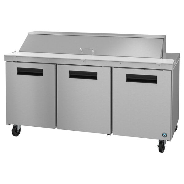 A stainless steel Hoshizaki sandwich top prep refrigerator with 3 doors.