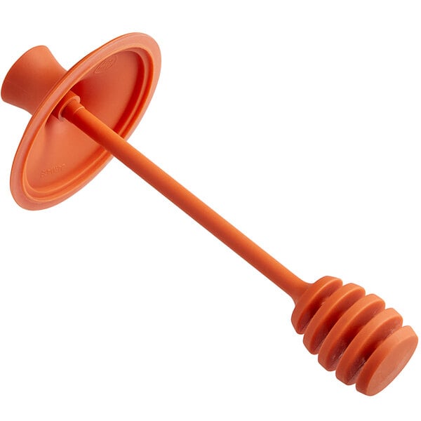 An orange plastic Fox Run honey dipper with a handle.