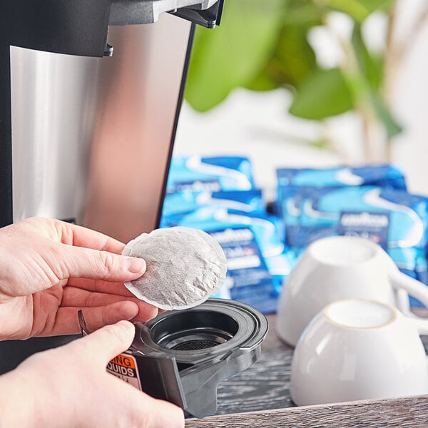 a round white object on a black surface