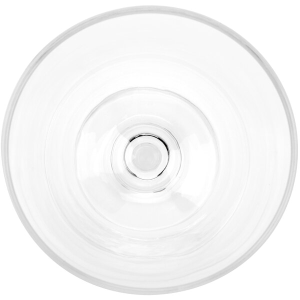 A close-up of a clear GET Social Club Tritan plastic cocktail glass.