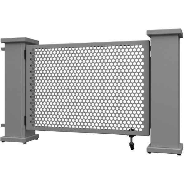 A close-up of a metal fence with a circle pattern.