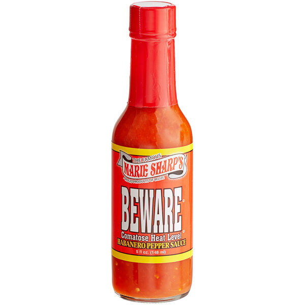 A bottle of Marie Sharp's Beware Comatose Habanero Hot Sauce.