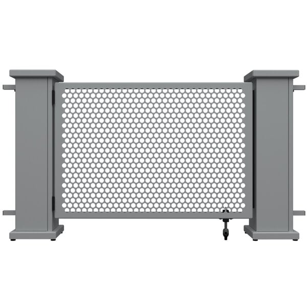 A grey metal gate with a circle pattern and planter stands.