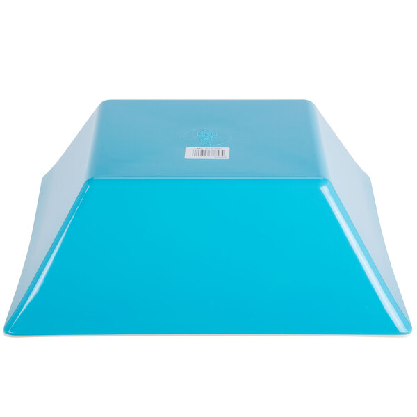 A blue square melamine bowl with a white label.