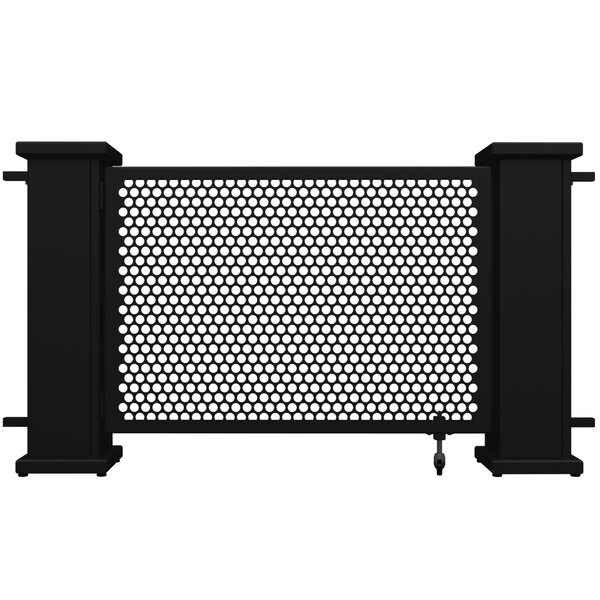 A black metal gate with a circle pattern in the middle.