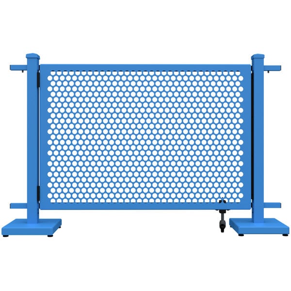 A sky blue metal gate with a circle pattern.
