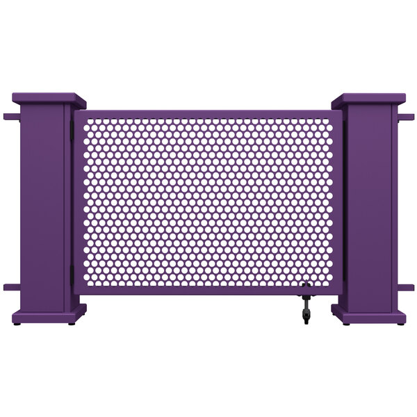 A purple metal fence with white circle patterns on the gate and planter stands.