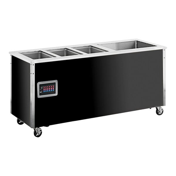 A black and silver Vollrath 4-Series non-refrigerated food station with four compartments on a stainless steel counter.