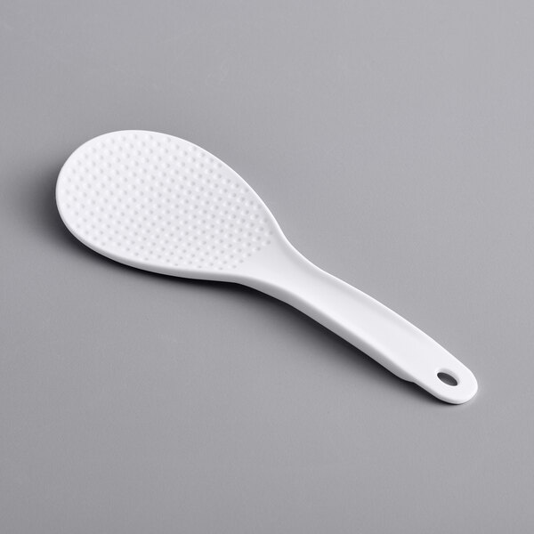 A white Choice solid plastic rice paddle.