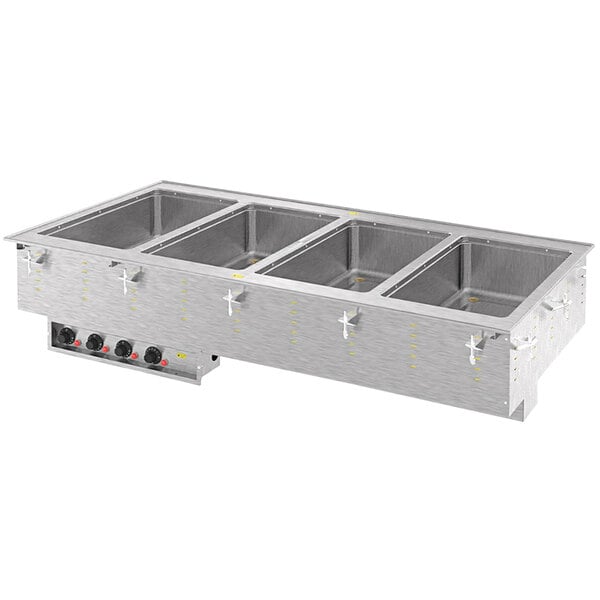 A Vollrath marine-grade drop-in hot food well with four compartments on a counter.