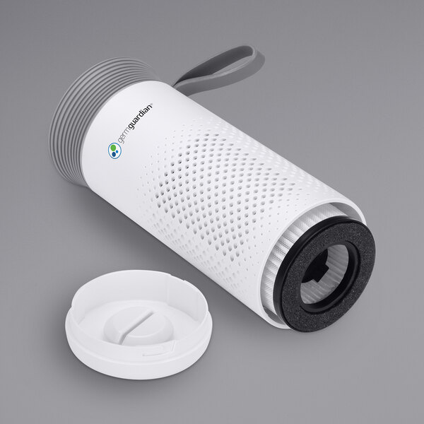 a white cylindrical device with a grey handle