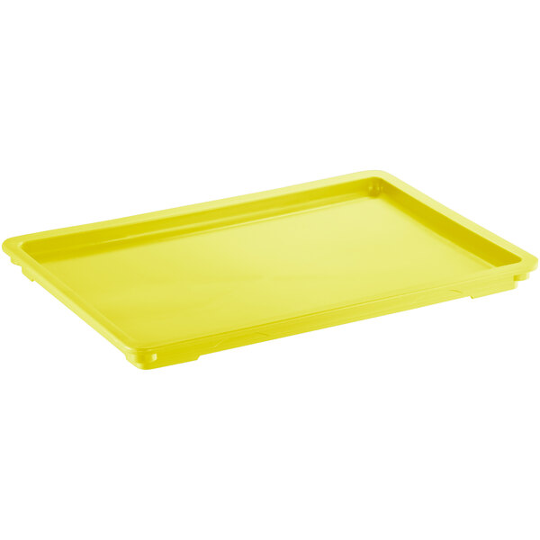 A yellow rectangular plastic tray lid.