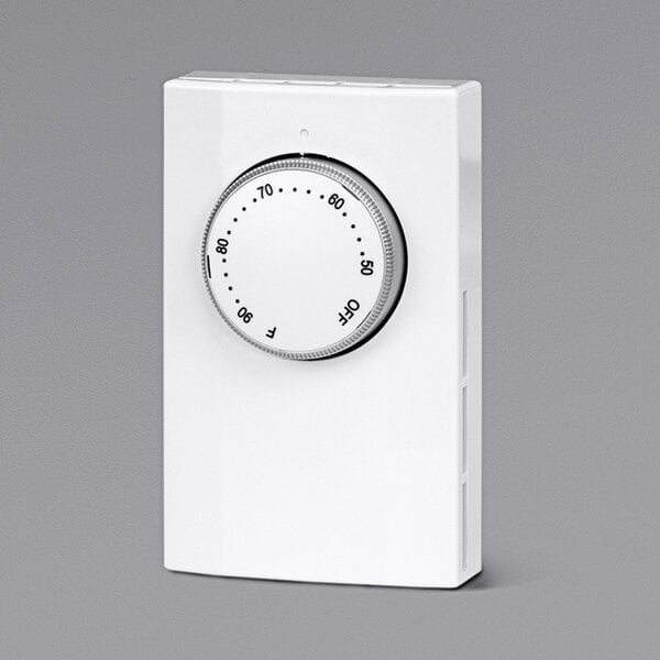 a white dial with black numbers