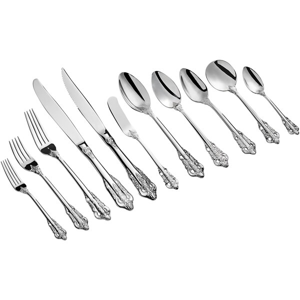 A close-up of an Acopa stainless steel demitasse spoon.