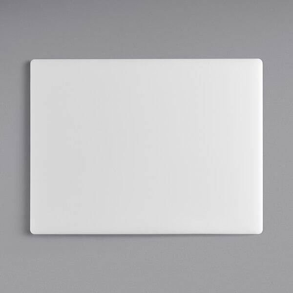 A white rectangular polyethylene cutting board with a black border.