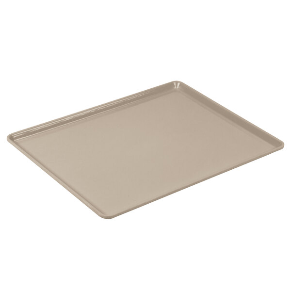 A rectangular taupe Cambro dietary tray with a plastic handle.