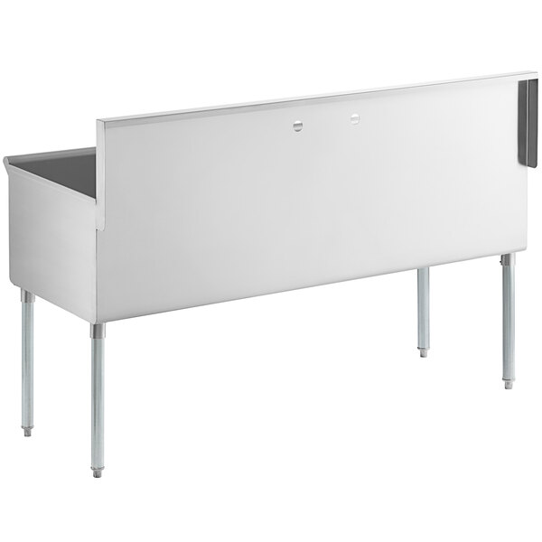 A white rectangular stainless steel Regency utility sink with two compartments and a drain on top.